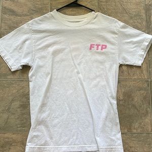 FTP White t-shirt with pink breast cancer ribbon on left sleeve